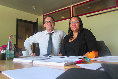 Lean Six Sigma Trainer John Dennis with a happy student in Geneva, Switzerland